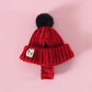 Knitted Hat with Plush Ball
