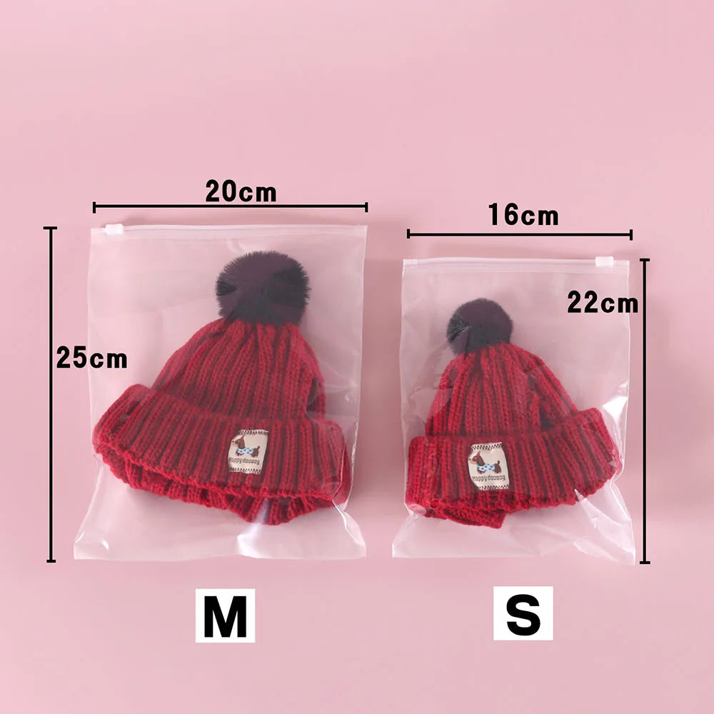 Knitted Hat with Plush Ball