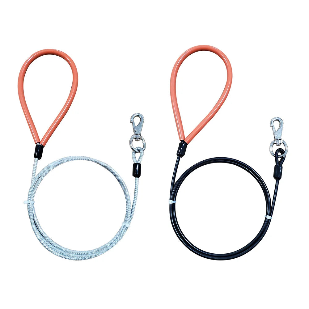Black and white coated steel cable dog leads with orange loop handles and swivel snap clips